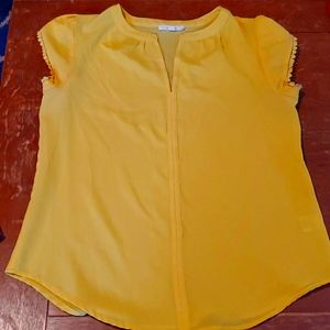 Yellow v-neck blouse